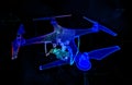 Abstract line and point drone. Drone flying with action video camera on dark blue. Polygonal low poly background with Royalty Free Stock Photo