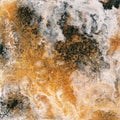 Abstract liquid gold background. Pattern with abstract golden and black waves. Marble. Handmade surface. Liquid paint