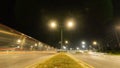 Abstract long exposure dynamic speed lights in the city with beautiful multi-colored lights, modern glitter in the night city Royalty Free Stock Photo