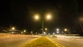 Abstract long exposure dynamic speed lights in the city with beautiful multi-colored lights, modern glitter in the night city Royalty Free Stock Photo