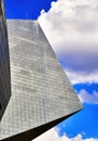 Abstract looking part of the facade of the Leuphana University, architect Daniel Libeskind, with blue-white sky