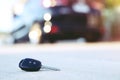 Abstract lost car keys fall lying on the street concrete Royalty Free Stock Photo