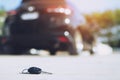 Abstract lost car keys fall lying on the street concrete cement ground Royalty Free Stock Photo