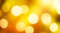 Abstract golden bokeh background with sparkling light particles and soft glowing circles Royalty Free Stock Photo