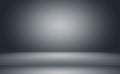Abstract luxury blur dark grey and black gradient, used as background studio wall for display your products. Plain Royalty Free Stock Photo