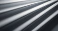 Abstract Metallic Surface with Diagonal Lines Reflecting Light and Shadow Play Royalty Free Stock Photo