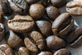 Abstract macro very high detail, high contrast closeup of multiple roasted coffee beans background