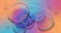 Abstract macro view of iridescent bubbles with translucent surfaces and gradient background Royalty Free Stock Photo