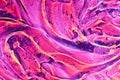 Abstract magenta pink, purple, red, orange cosmetic gel serum background texture