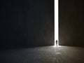 Abstract man in dark concrete interior with glowing doorway and light rays coming in. 3d rendering