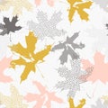 Abstract maple leaves seamless pattern in gold and grey colors