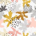 Abstract maple leaves seamless pattern in gold and grey colors