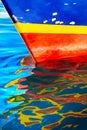 Abstract marine background. Multi-colored bright reflection of old sea ship in the water.