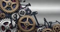 Mechanical gears and tool silhouettes on brushed metal Royalty Free Stock Photo