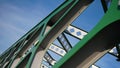 Abstract metal construction. Details of the metallic green bridge in Bratislava, Slovakia. Industrial construction. Royalty Free Stock Photo