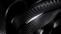 Abstract metal spinning stripes on a black background, monochrome. Design. Long tangled mechanism. Royalty Free Stock Photo