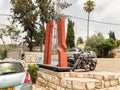 Abstract metallic red exhibit made by a local artist in the famous artists village Ein Hod near Haifa in northern Israel