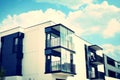Modern apartment building exterior. Retro colors stylization Royalty Free Stock Photo