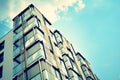 Modern apartment building exterior. Retro colors stylization Royalty Free Stock Photo