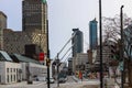 Montreal modern architecture - urban style, high-rise buildings, glass and concrete, street, empty road, cloudy day Royalty Free Stock Photo