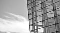 Abstract modern architecture with high contrast black and white tone. Architecture of geometry at glass window - monochrome. Royalty Free Stock Photo
