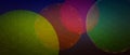 Abstract modern art background design with circles and spots in colorful pink, red, yellow, and green on light dark blue backgroun Royalty Free Stock Photo