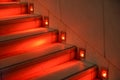 Abstract modern red stairs with warm light - stairway composition Royalty Free Stock Photo