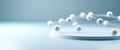 Abstract molecular structure model with interconnected white spheres on a circular platform against a soft blue background Royalty Free Stock Photo