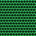 Abstract monochrome background with green hearts on a black background