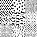 Abstract monochrome hand drawn ink black and white seamless patterns set. Brush doodle vector repeated illustration for Royalty Free Stock Photo