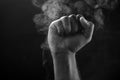 Image of a fist and smoke Royalty Free Stock Photo