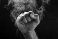Image of a fist and smoke Royalty Free Stock Photo