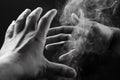 Image of hands and smoke Royalty Free Stock Photo