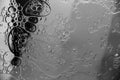 Abstract moon background circles and oil stains on water