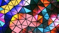 Abstract mosaic background, colorful polygons on black, trangle shapes stained glass