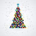 Abstract mosaic christmas tree from CMYK triangles