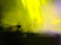 Abstract motion blur effect. Bokeh lighting in concert with audience