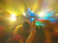 Abstract motion blur effect. Bokeh lighting in concert with audience