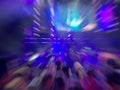 Abstract motion blur effect. Bokeh lighting in concert with audience