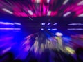 Abstract motion blur effect. Bokeh lighting in concert with audience