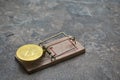 Abstract mouse trap with cryptocurrency Bitcoin