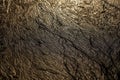 Abstract mud background with water washout trails and selective focus