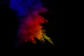 Abstract multi color powder explosion on black background Royalty Free Stock Photo