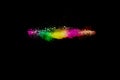 Abstract multi color powder explosion on black background. Freeze motion of colorful dust particles splash. Painted Holi Royalty Free Stock Photo