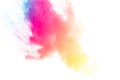 Abstract multicolored dust splatter on white background.
