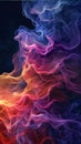 Abstract multicolored smoke from the incense sticks on a dark background