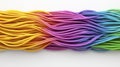 Abstract Multicolored Strands Flowing on White Background Royalty Free Stock Photo