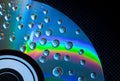 Abstract music background, water drops on CD/DVD Royalty Free Stock Photo