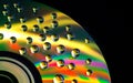 Abstract music background, water drops on CD/DVD Royalty Free Stock Photo
