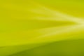 Abstract mustard green horizontal background made of bends, waves and highlights